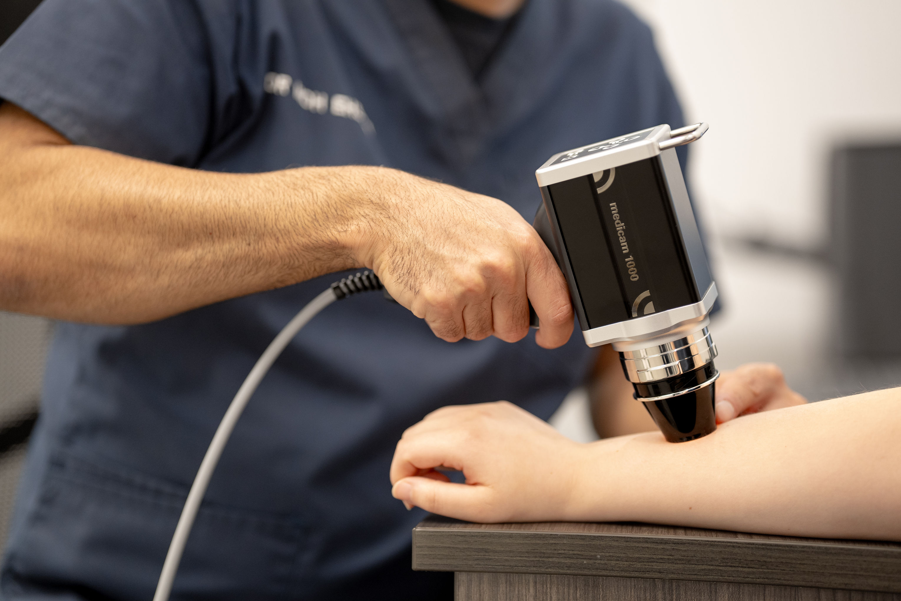 Dermoscopic skin examination equipment used during a clinical skin check